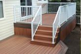 Stairs and composite deck with aluminium railings.
